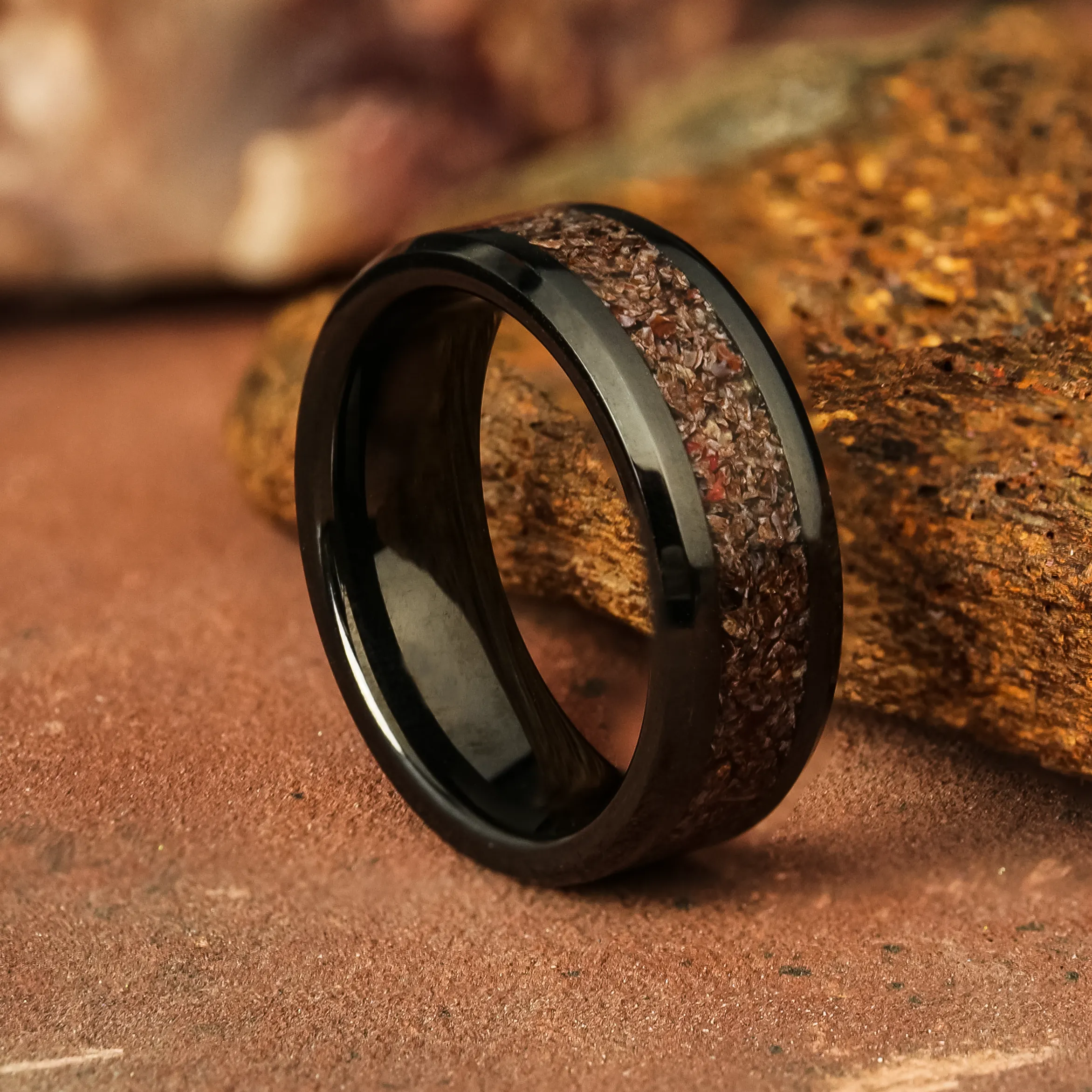 Prehistoric Dinosaur Bone Glowstone Ring on Black Ceramic